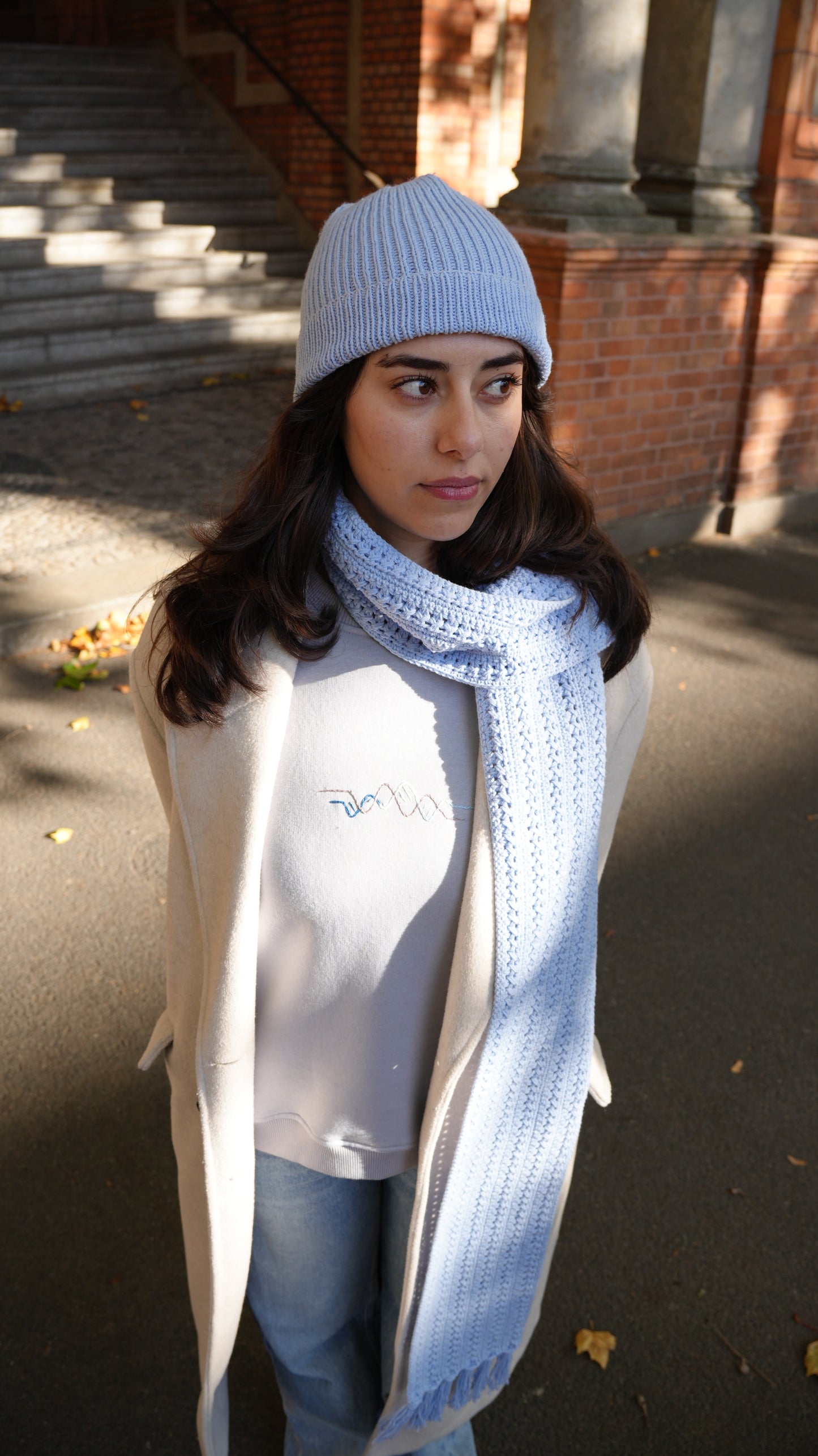 Model wearing Mozaika Collective Sky Blue Beanie second look, fresh everyday knitted hat