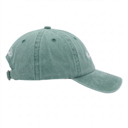 Washed Green Cap side view showing adjustable silver buckle