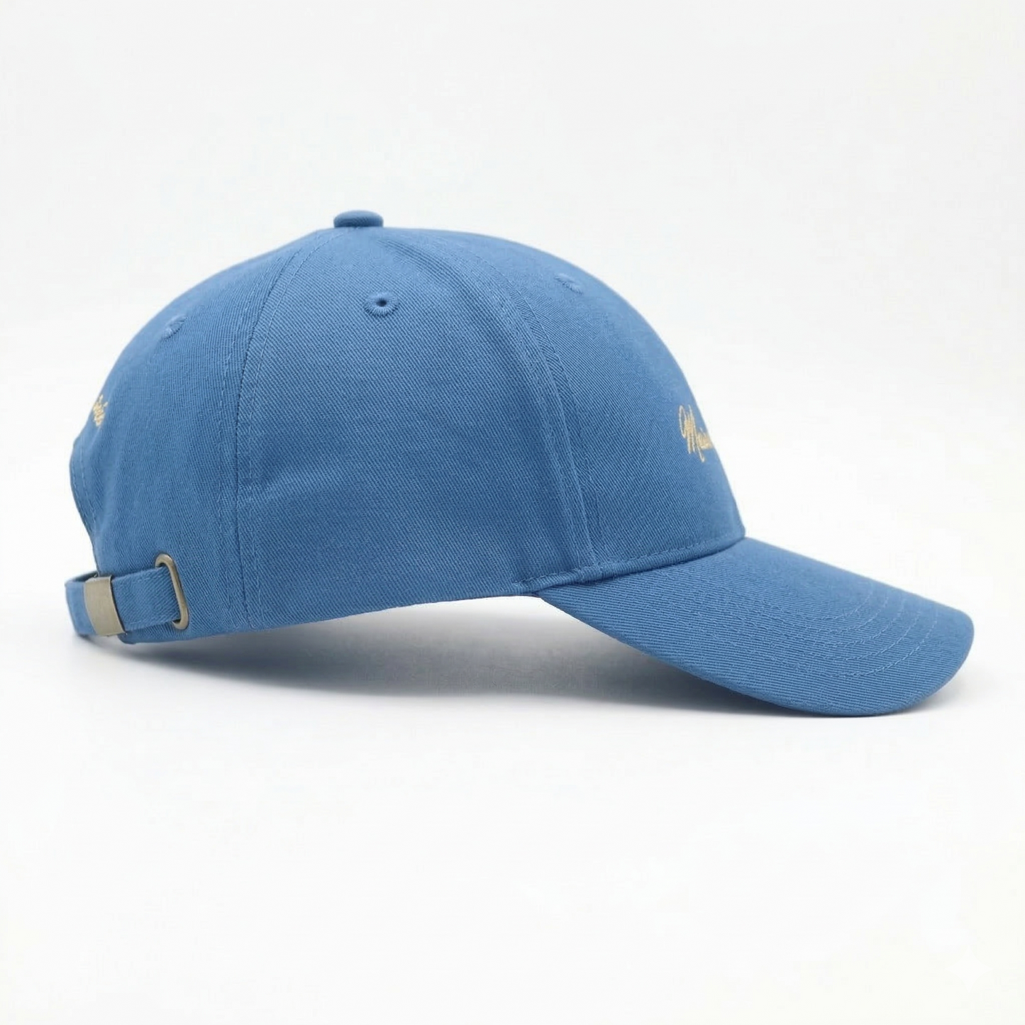 Blue Cap side view showing adjustable silver buckle