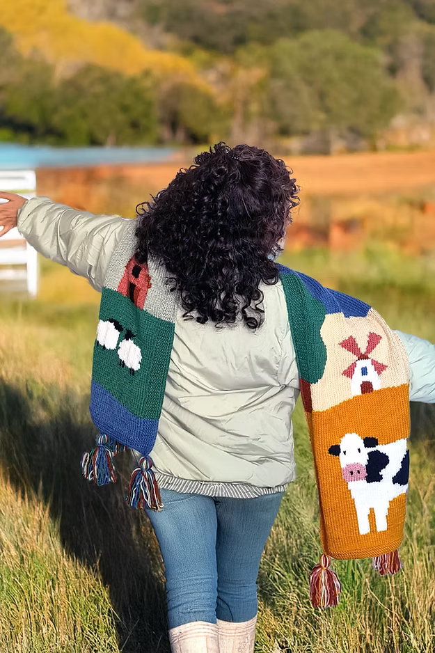 Zone Design handknitted Farm Scarf worn by model, unique artisan accessory