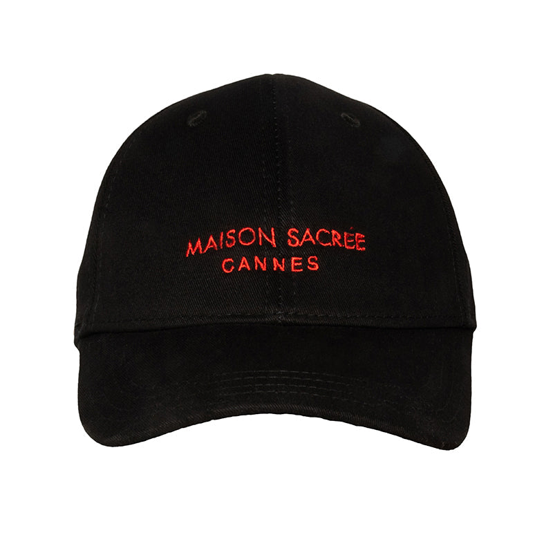 Maison Sacrée Black Cap front view — signature embroidery