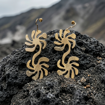 Mozaika Collective Solaris Earrings close-up showing hand-formed solid brass double swirl detail