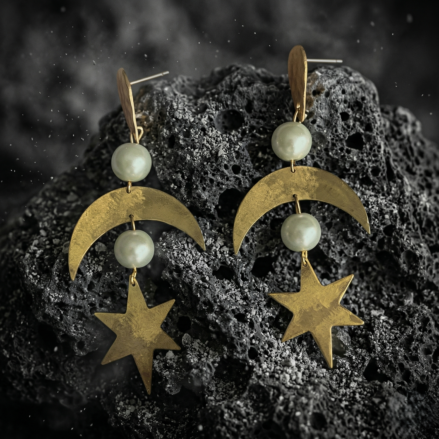 Mozaika Collective Star and Moon Earrings close-up showing hand-hammered brass crescent detail and pearl