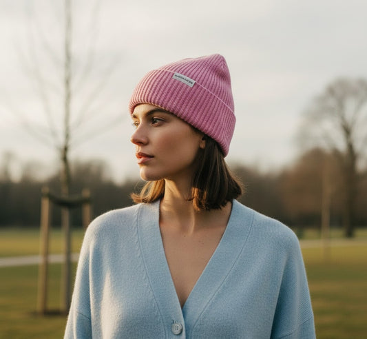 Model wearing Maison Sacrée Pink Knitted Beanie, playful premium cotton wool beanie