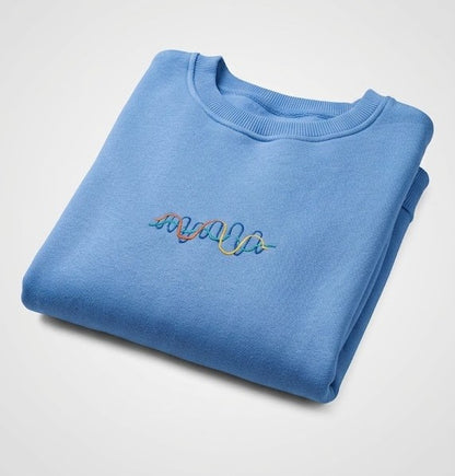 Momeni Vivaldi Spring Blue Sweatshirt detail showing hand embroidery motifs
