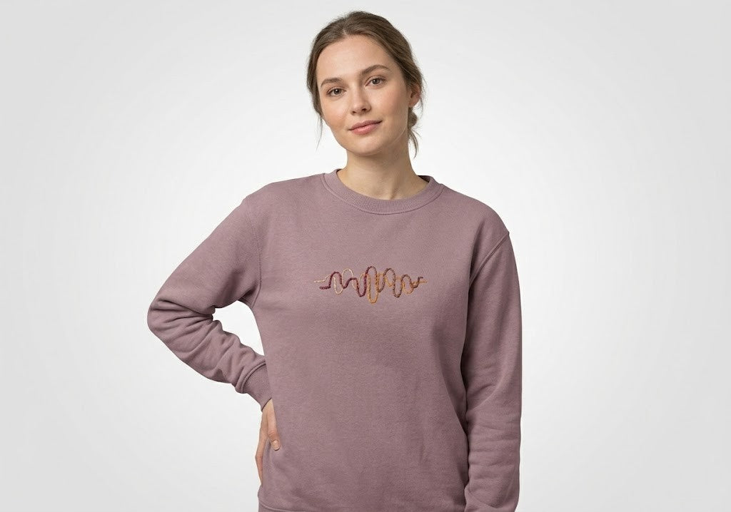Model wearing Momeni Vivaldi Autumn Lilac Sweatshirt, unique artisan embroidered sweatshirt